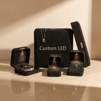 Emballage de boîte à bijoux LED avec logo personnalisé en Chine boîte à bijoux en velours léger LED vente en gros de boîtes parure de bijoux personnalisée avec lumière