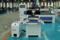 Machine de fraisage et de gravure CNC 6060 4040 à broche 2,2 kW à bon prix pour le traitement des moules 3D en cuivre, aluminium et métaux