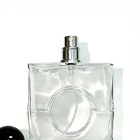 Flacon de parfum en verre transparent carré de haute qualité, personnalisable, avec bouchon rond noir pour l'emballage de parfum