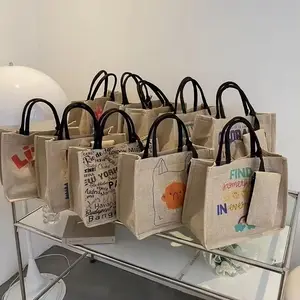 Grosir tas rami Tote goni tahan air ramah lingkungan alami tas hadiah belanja Linen dilapisi kustom dengan Logo cetak