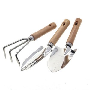 Ensemble d'outils de <span class=keywords><strong>jardinage</strong></span> pour femmes durable de 4 pièces comprenant une houe, une bêche, un râteau, des outils de terrassement à main, boîte en carton OEM personnalisable - Product Image 1