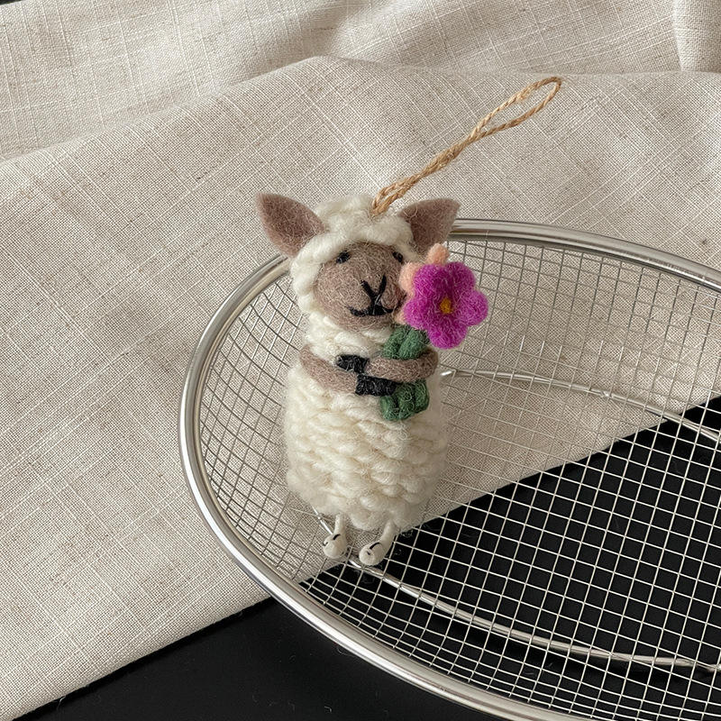 Oveja de cara de tres flores de 12 cm.