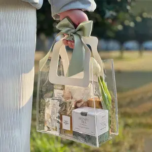 Sıcak satış su geçirmez şeffaf şeffaf PVC plastik alışveriş çantası torba PVC el hediye saplı çanta için hediye paketi