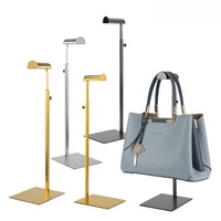 Porte-sacs métallique au design moderne et épuré, réglable et recyclable, support de présentation autoportant pour vêtements et magasins de détail