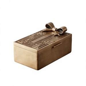 Luxury Rectangular Gold Metal Date And Dry Fruit Storage Box Geometric Embossed Lid With 3D Ribbon Bow Accent - Product Image 1