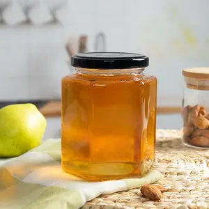 ขายส่งที่กำหนดเองคุณภาพสูง770ML Hexagonal Honey Jam Jar แก้ว Gourmet Hex ขวดสกรูดีบุกสำหรับอาหาร,Candy,น้ำผึ้ง