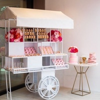 Offre Spéciale personnalisé en bois fleur barre de bonbons chariot avec roues pour mariage enfants noël dessert fête présentoir