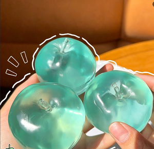 Jouet en peluche transparent bleu en forme de pomme, jouet compressible non élastique, rempli de vaseline, jouet anti-stress - Product Image 1