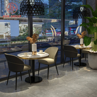 Ensemble table et chaises de restaurant en cuir moderne de Foshan pour café, salon de thé, hôtel, vente en gros de meubles