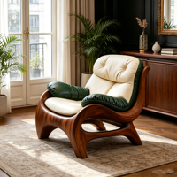 Fauteuil de détente contemporain élégant à silhouette courbée, avec coussin moelleux et accoudoirs capitonnés, pour la maison, l'hôtel et l'usage commercial