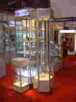 Vitrine tournante électrique hexagonale en verre/vitrine en verre tournant avec serrure