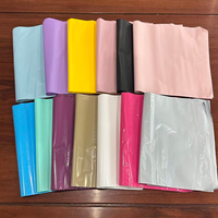 Sac de courrier personnalisé Guandu avec impression d'un nœud de cerise rose poly Mailers Vente en gros d'usine Sac d'expédition recyclable auto-obturant Fourniture