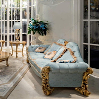 Sofá clásico francés de lujo elegante de gama alta con talla de rosa de madera maciza de tela azul