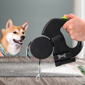 Vente chaude Portable Multifonctionnel Rétractable 3m Ruban En Plastique Décoré Pet Double Chien Laisse avec Lumière Merde Boîte De Rangement - Product Image 1