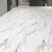 Dalles en porcelaine effet marbre Calacatta Gold poli et émaillé 750x1500mm pour salon