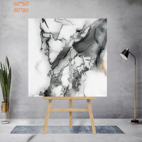 Carreaux de marbre de Carrare décoratifs pour maison moderne revêtement de sol mural intérieur en or noir avec céramique à motifs dorés pour villas