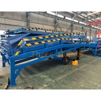 Meilleure vente de remorque de camion à plat plate-forme de travail mobile rampe de quai de chargement hydraulique populaire pour le levage de conteneurs