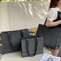 Sacs en papier brun imprimés au détail personnalisés de luxe avec logo personnalisé pour vêtement