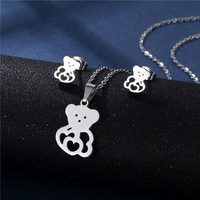 Vente en gros de colliers à breloques classiques en acier inoxydable, ensemble de colliers à breloques géométriques simples, design d'amour lisse, deux pièces, cadeau d'anniversaire