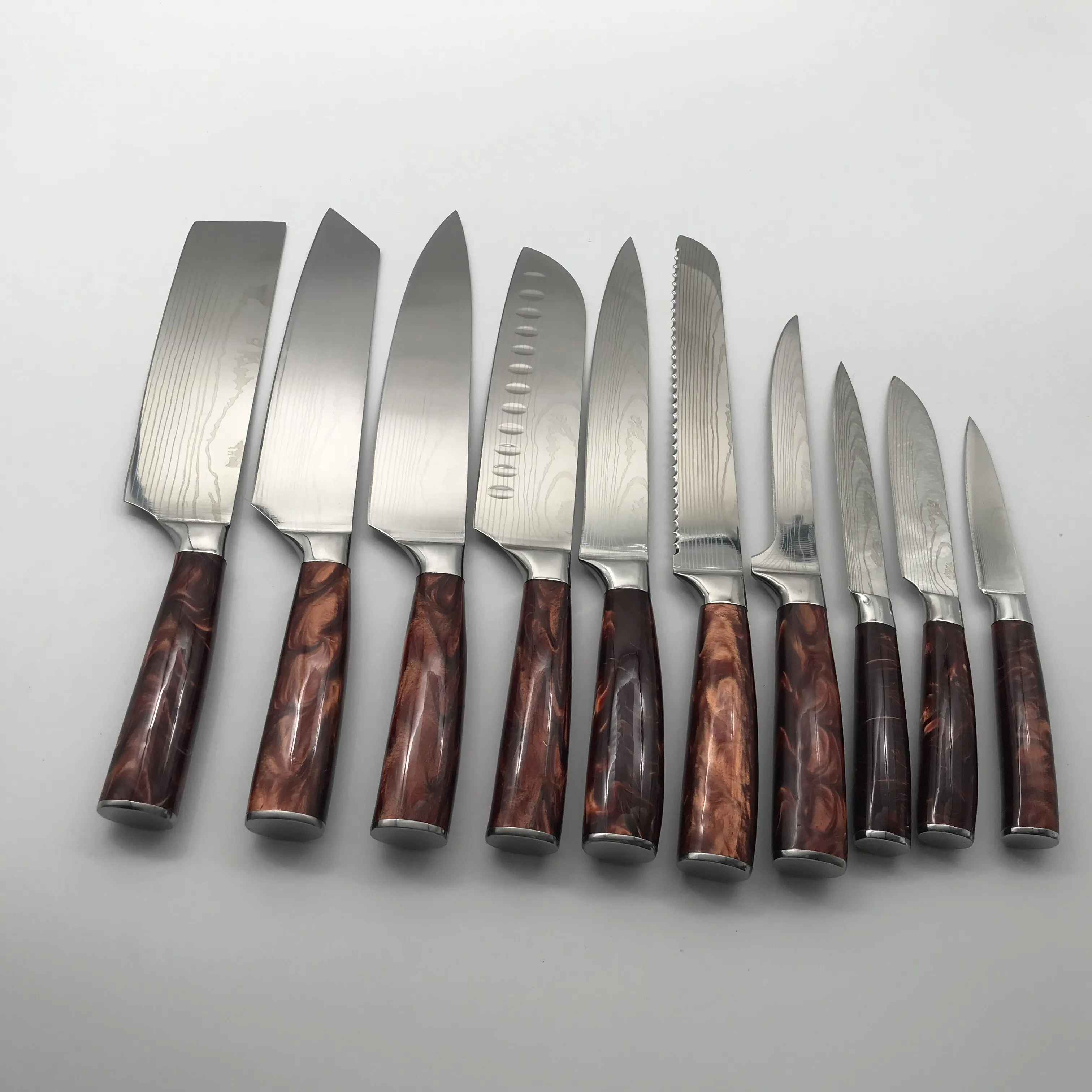 उत्तम लेजर दमिश्क पैटर्न शेफ चाकू ब्रेड चाकू फल चाकू संयोजन राल हैंडल के उत्पादन में विशेषज्ञता