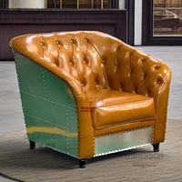 Canapé en cuir vintage pour fauteuil aviateur avec peigne à rivets en aluminium de style industriel pour salon, chambre à coucher ou villa
