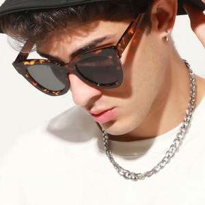 Lunettes de soleil œil de chat pour femmes, monture léopard noire, logo personnalisé, protection UV400, nouvelle collection 2025, vente chaude - Product Image 4