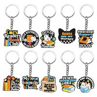 Porte-clés en PVC à thème chat, breloques souples en caoutchouc pour sacs, cadeau pour les amoureux des livres, pendentif décoratif pour sac à dos, idéal pour les lecteurs, vente en gros