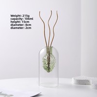 Diffuseur d'huiles essentielles d'intérieur simple haut de gamme moderne Ornement en verre d'arôme sans flamme Vase de table en rotin Bouteille vide pour