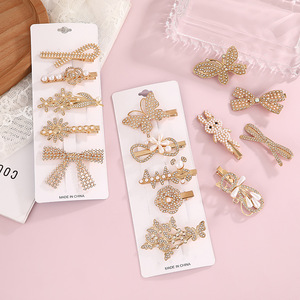 Juego de pinzas para el cabello estilo coreano con perlas y diamantes de imitación, pinza lateral con diseño de mariposa, corazón y lazo, accesorio para el cabello de uso diario, hecho en China. - Product Image 3