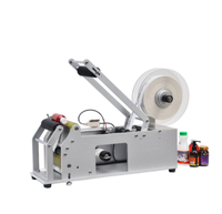 Machine d'étiquetage pour bouteilles rondes semi-automatique