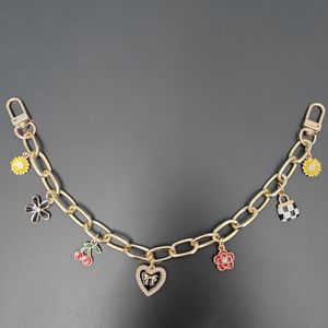 2025 concepteur cerise fleur coeur pendentif <span class=keywords><strong>sac</strong></span> <span class=keywords><strong>à</strong></span> <span class=keywords><strong>main</strong></span> breloques décor métal <span class=keywords><strong>mousqueton</strong></span> boucle <span class=keywords><strong>sac</strong></span> chaîne pour femmes <span class=keywords><strong>sac</strong></span> <span class=keywords><strong>à</strong></span> <span class=keywords><strong>main</strong></span> accessoires - Product Image 5