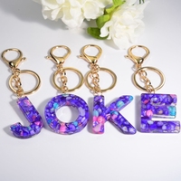 Vente en gros de porte-clés porte-clés porte-clés majuscule 26 lettres porte-clés mot anglais frange porte-clés résine Flash acrylique pendentif