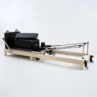 Fournisseur d'équipements de Pilates : Reformer pliable en bois d'érable, durable et portable pour usage domestique et studio de Pilates
