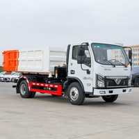 Camion benne SINOTRUK 10 roues avec système de levage hydraulique pour la gestion des déchets commerciaux et les centres de recyclage