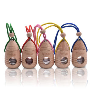 Ambientador para Auto de 3 ml, Difusor de Perfume con Tapa de Madera Colgante para Auto - Product Image 1