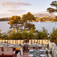 Banc de restaurant extérieur commercial en bois moderne personnalisé canapé meubles hôtel de luxe en cuir ensemble de sièges table et chaise projet