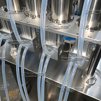 Machine de remplissage de parfum sous vide pour bouteilles en verre, équipement d'embouteillage automatique d'huile essentielle avec système sans goutte sans mousse