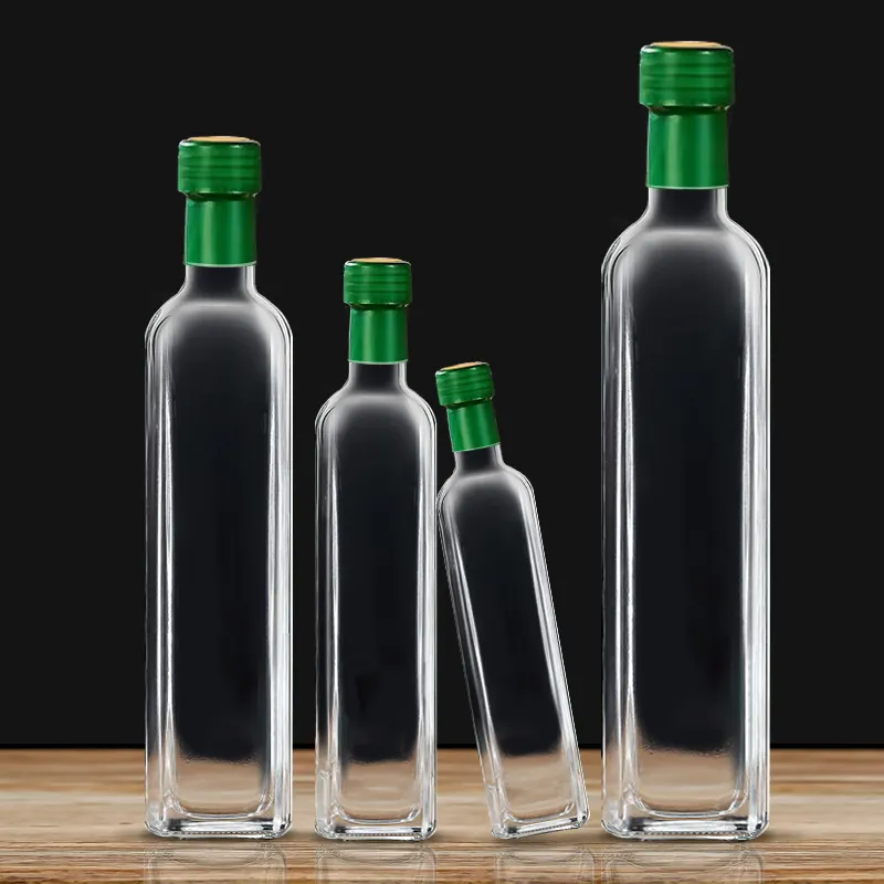 Bottiglie di olio d'oliva in vetro vuote rotonde trasparenti bottiglia di vetro bottiglia di olio d'oliva quadrata con tappi in plastica di alluminio