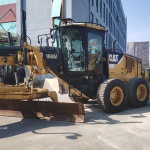 Motoniveladora de ruedas usada de tamaño pequeño Caterpillar 160M Original de EE. UU. a la venta - Product Image 2