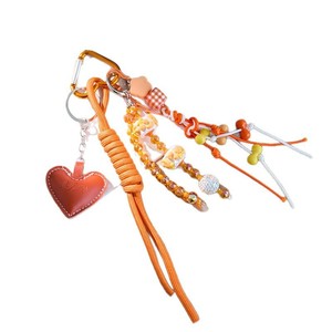 TG-2685 กระเป๋าใส่เงินขนาดเล็กทรงหัวใจสีส้ม ทำจากหนังบุด้วยผ้าฝ้ายแบบสามมิติ  งานถักมือสไตล์โรมัน  พร้อมจี้ห้อยรูปหัวใจ - Product Image 5