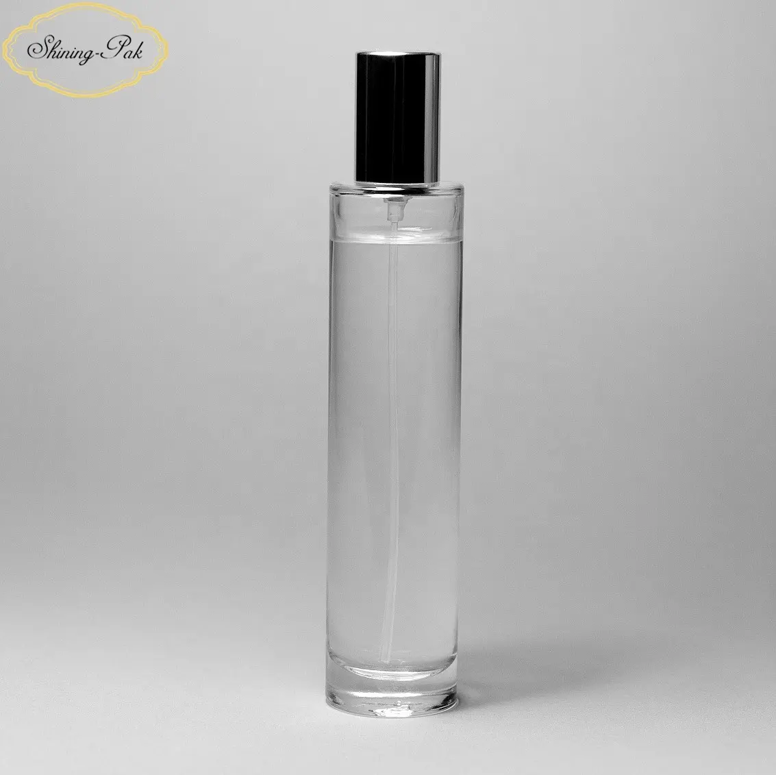 Venta al por mayor del Oem elegante único del cilindro 100Ml botella de Perfume de vidrio con tapa de aerosol