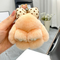 10cm réel Rex lapin fourrure peluche porte-clés mignon lapin lapin porte-clés Kawaii arc ruban en peluche porte-clés jouets pour femmes sac breloques