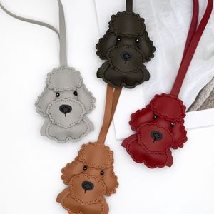 Goreal 2025 nueva llegada bolso de mujer encantos oso de peluche perro juguete caniche cuero muñeca bolso decoración Metal llaveros - Product Image 4