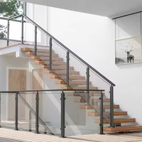 Escalier flottant moderne sur mesure en métal pour villa, à poutre simple en I, avec rampe en verre