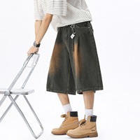 Jean en denim tissé respirant, coupe droite, taille mi-haute, longueur trois-quarts, légèrement élastique, délavé et vieilli, idéal pour l'été