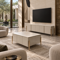 Ensemble de meuble TV et table basse WYRAX en deux pièces avec dessus aspect marbre blanc, coins arrondis, pieds dorés et rangement