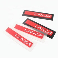 Étiquettes en caoutchouc PVC souple personnalisées avec logo en relief pour sac à dos