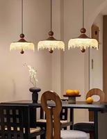 Lustre minimaliste pour escalier de villa duplex avec plafond haut, lampe suspendue en noyer pour escalier de grenier.