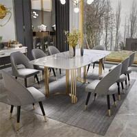Ensemble de salle à manger moderne pour la maison, table à manger avec base en métal doré et chaises rembourrées douces