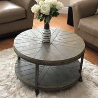 Table basse ronde en bois massif MAGI, style rustique industriel, avec roulettes